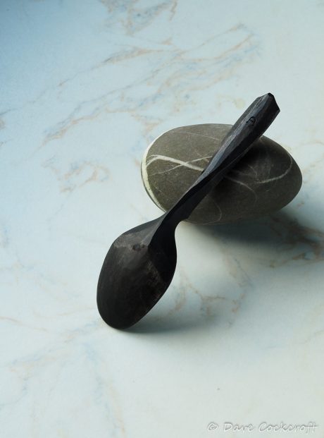 ebonised spoon on pebble-14
