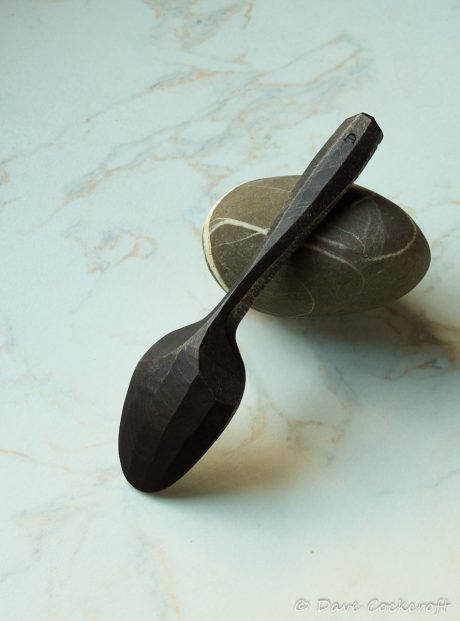 ebonised spoon on pebble-20