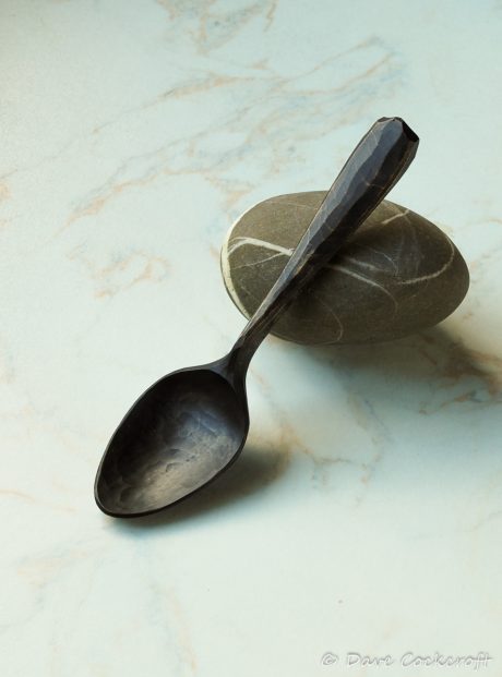ebonised spoon on pebble-23