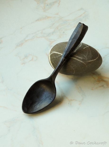 ebonised spoon on pebble-29
