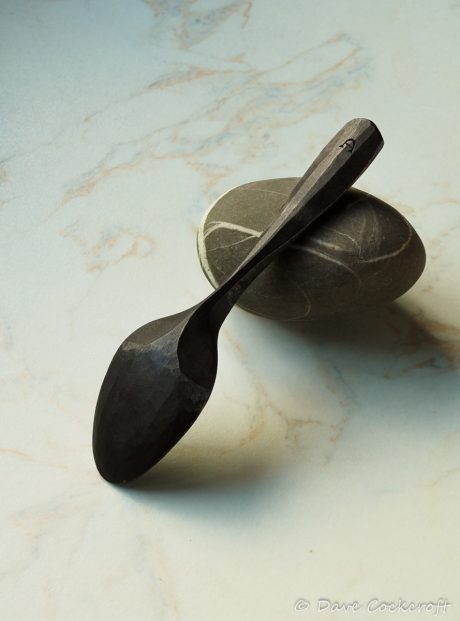 ebonised spoon on pebble-4