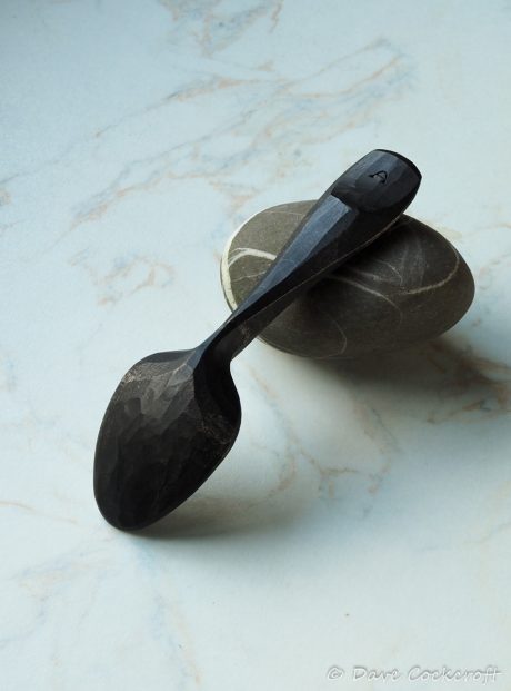ebonised spoon on pebble-6
