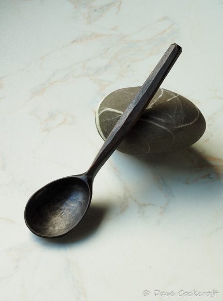 ebonised spoon on pebble-7