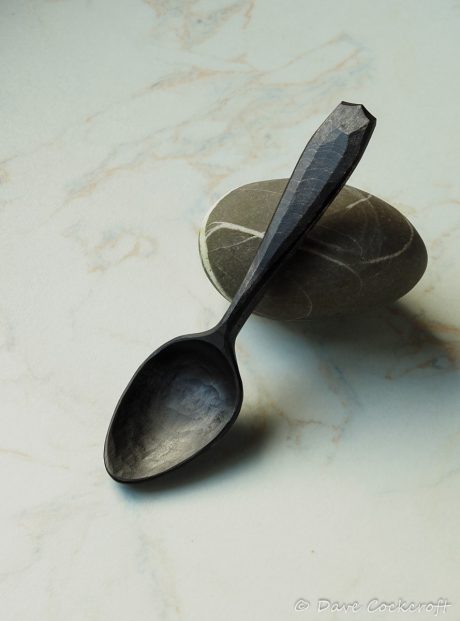 ebonised spoon on pebble-9